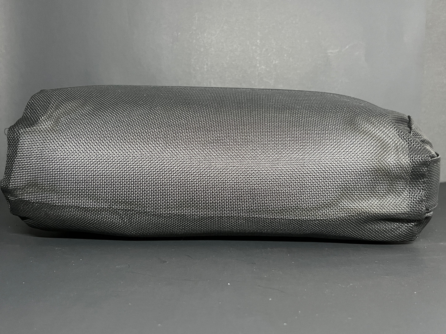 Side view of the Water Brick (black) spa booster seat.